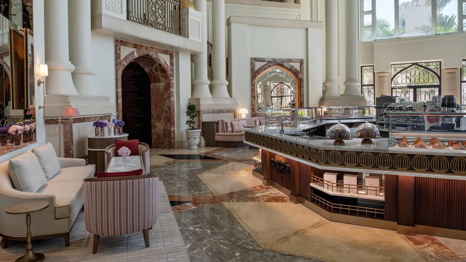 A sitting area with large windows.