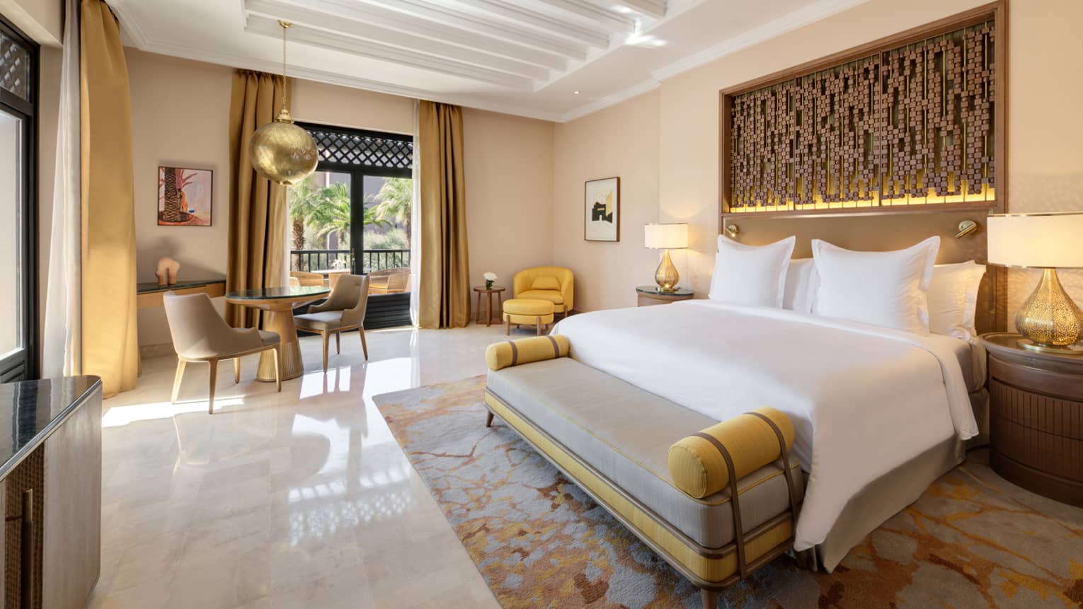 Moroccan hotel room with king bed