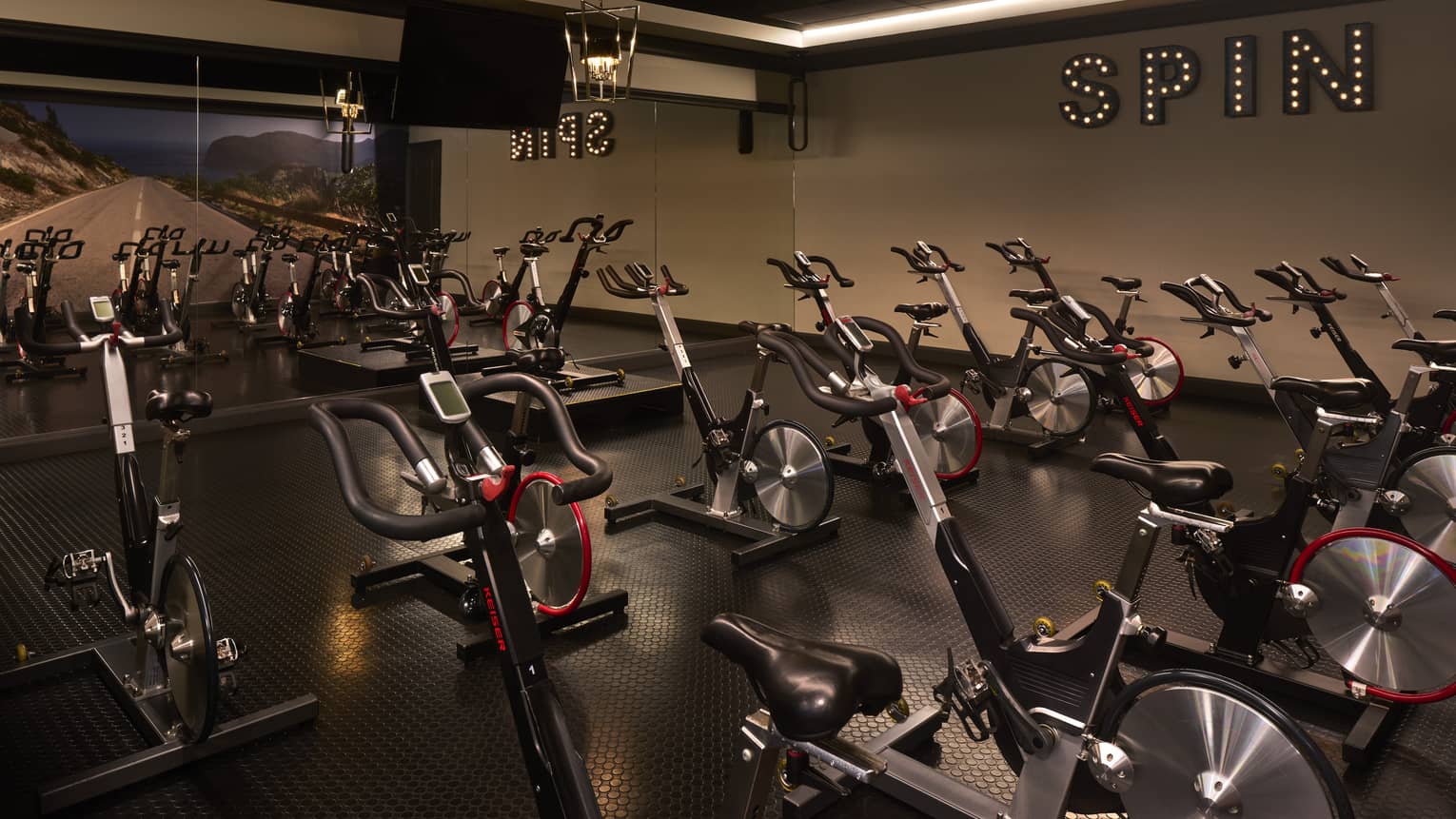 Bike machines in an exercise room.