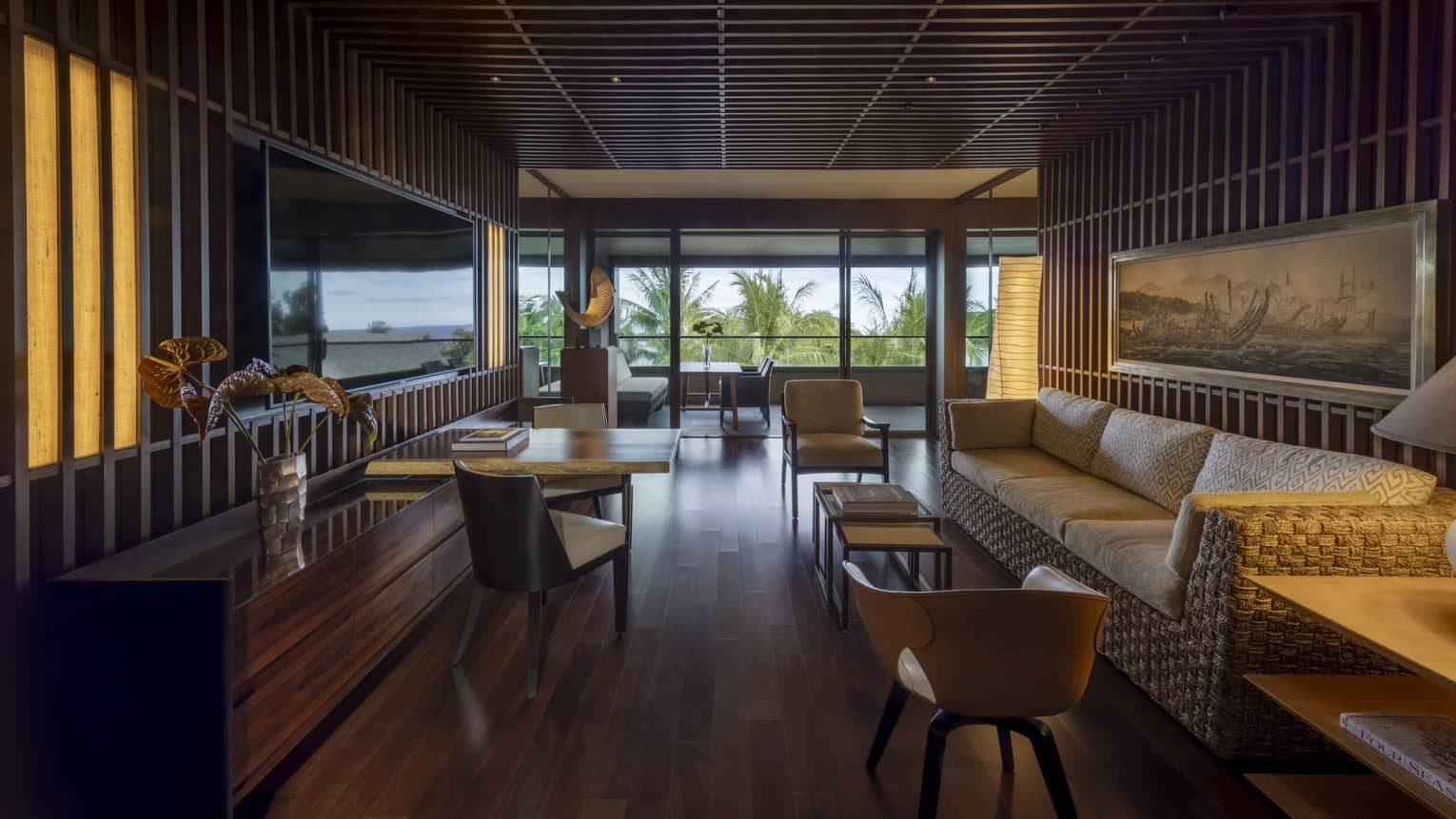 Living area with dark-wood floors, penthouse suite at Four Seasons Resort Lanai