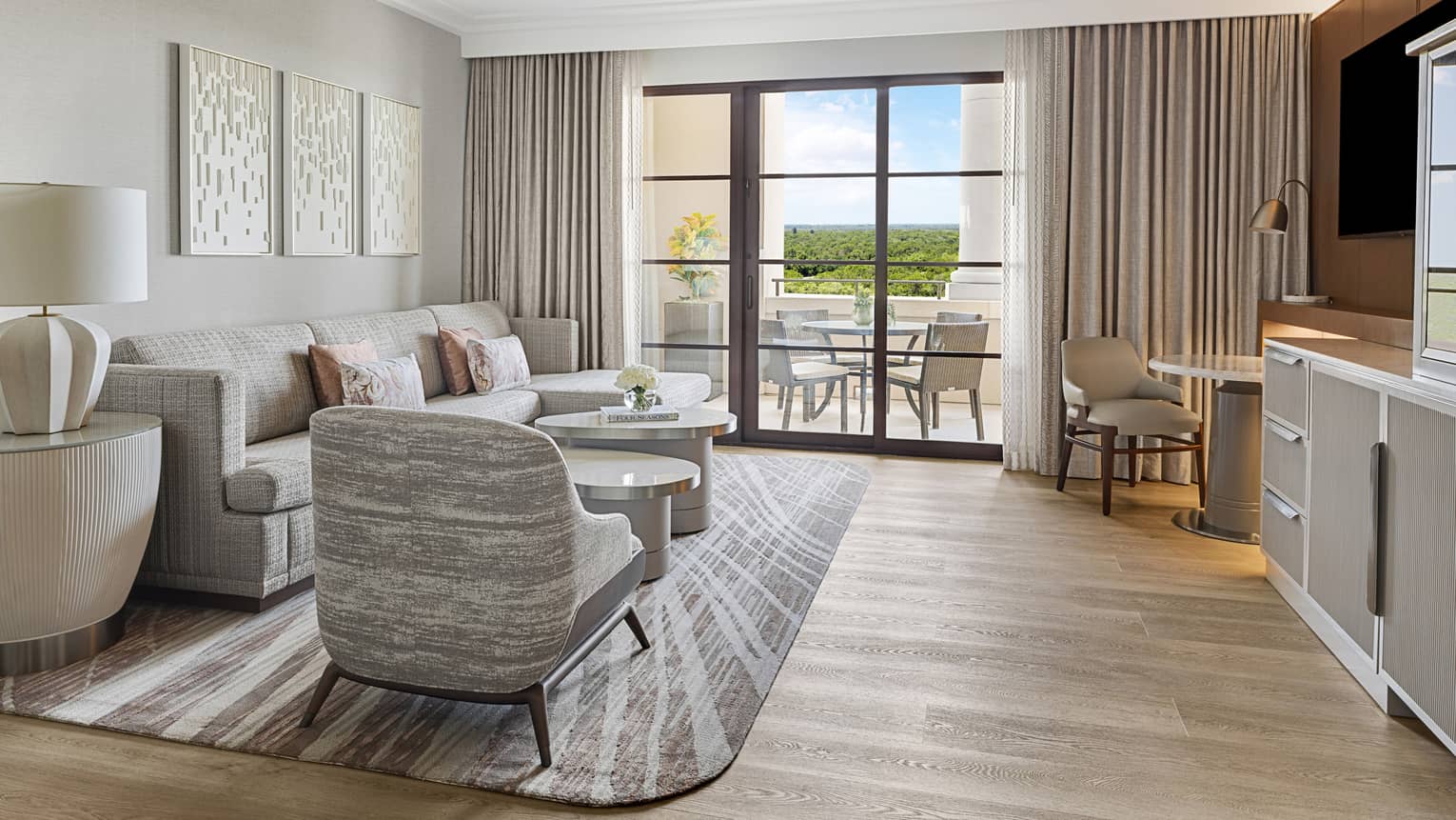 Hotel room living room with walk-out balcony