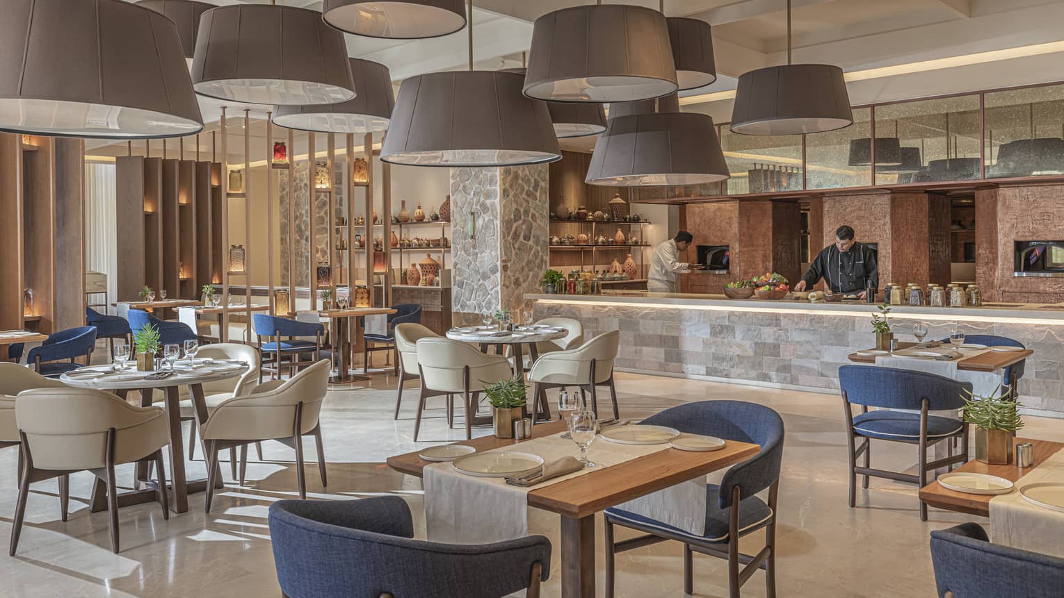 Zitouni restaurant with domed overhead lighting, granite bar, intimate seating, natural light