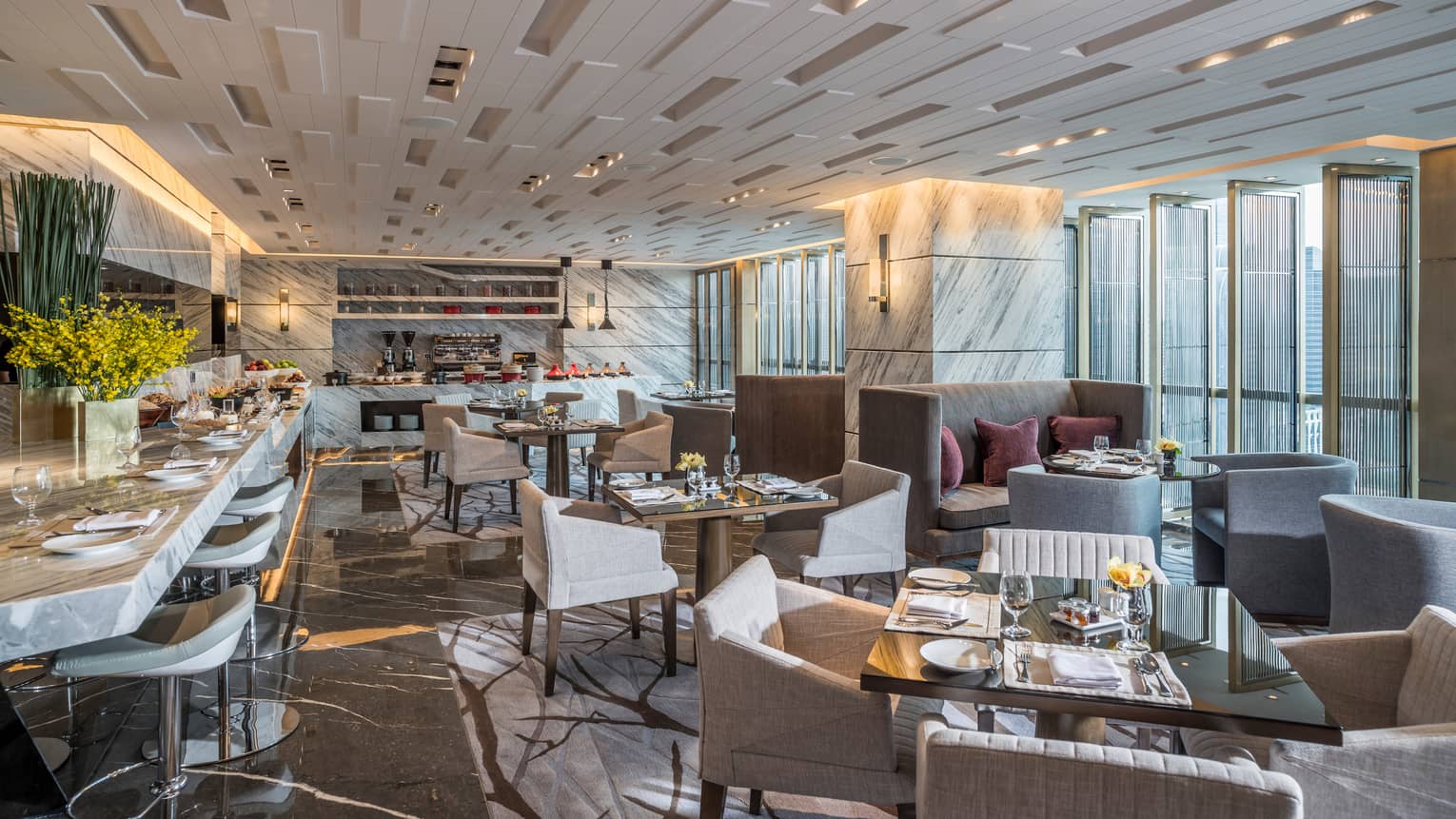 Executive Club Lounge modern dining room with decorative white ceilings, marble bar