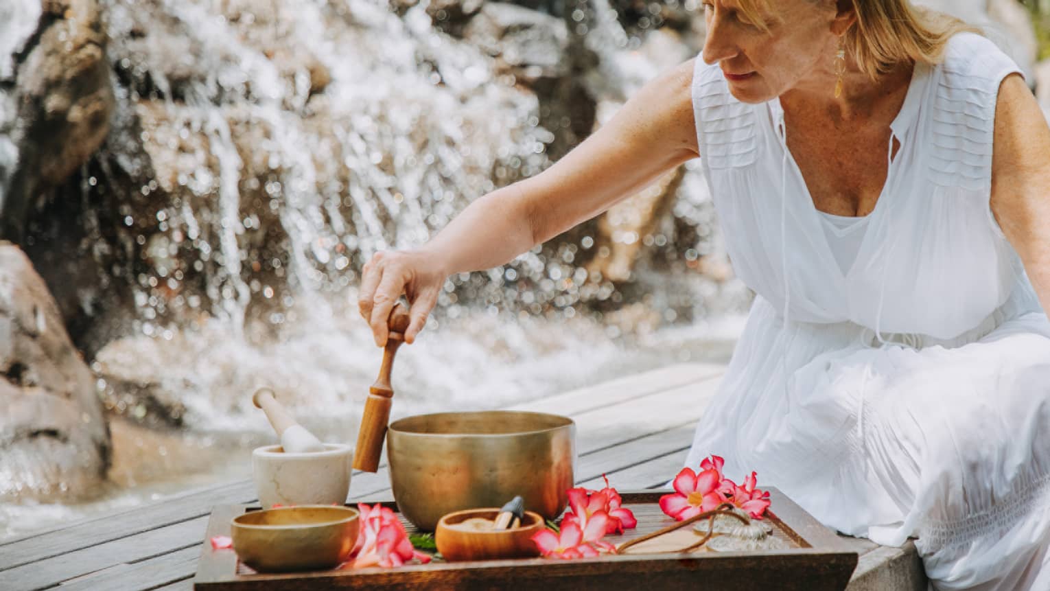 Resident spa intuitive Maryanne Rose leading a vibrational forest essence session, focusing on energy work