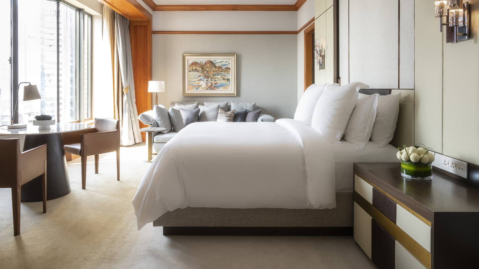 Governor Suite Bedroom with small dining area and floor-to-ceiling windows