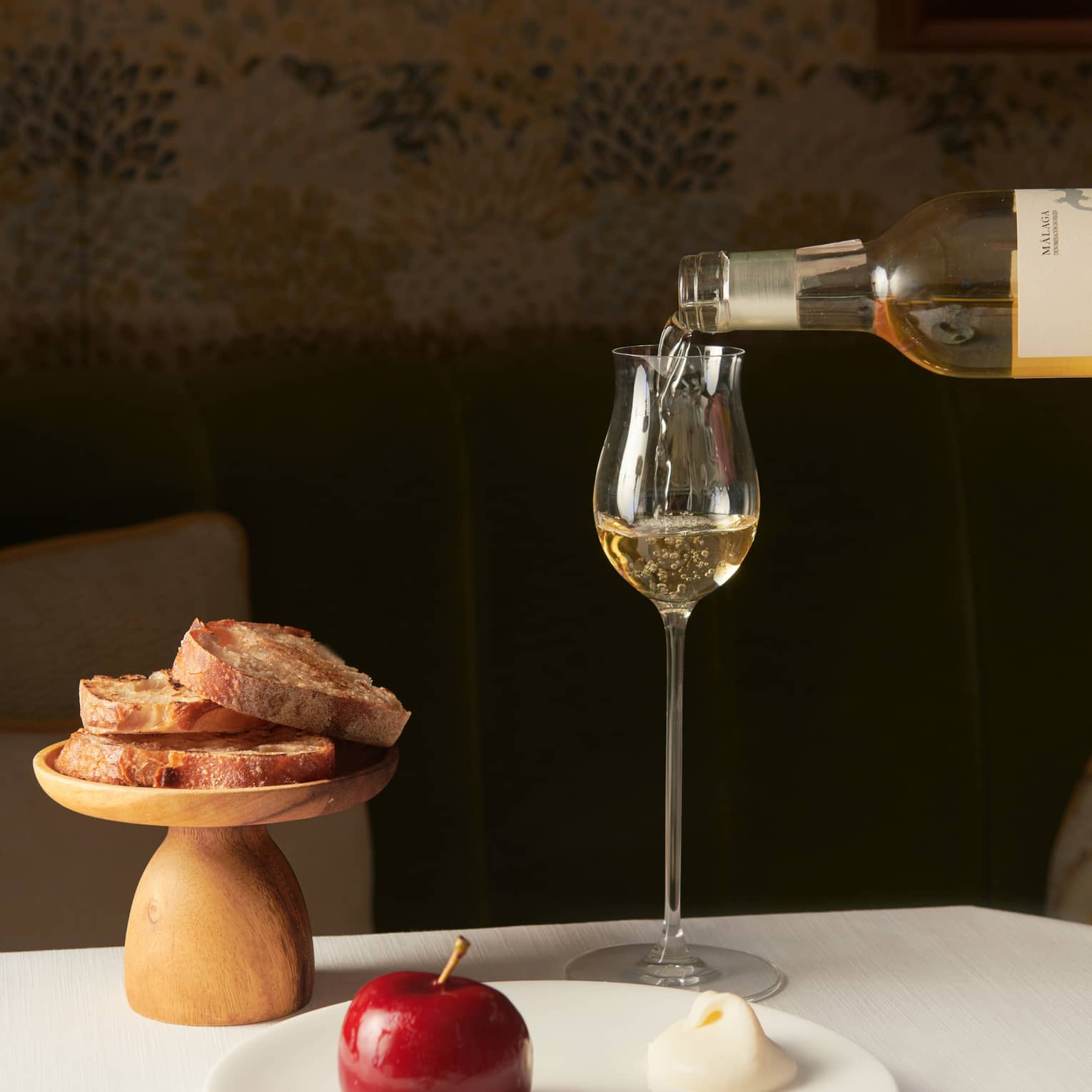 Glass of white wine and accompanying food