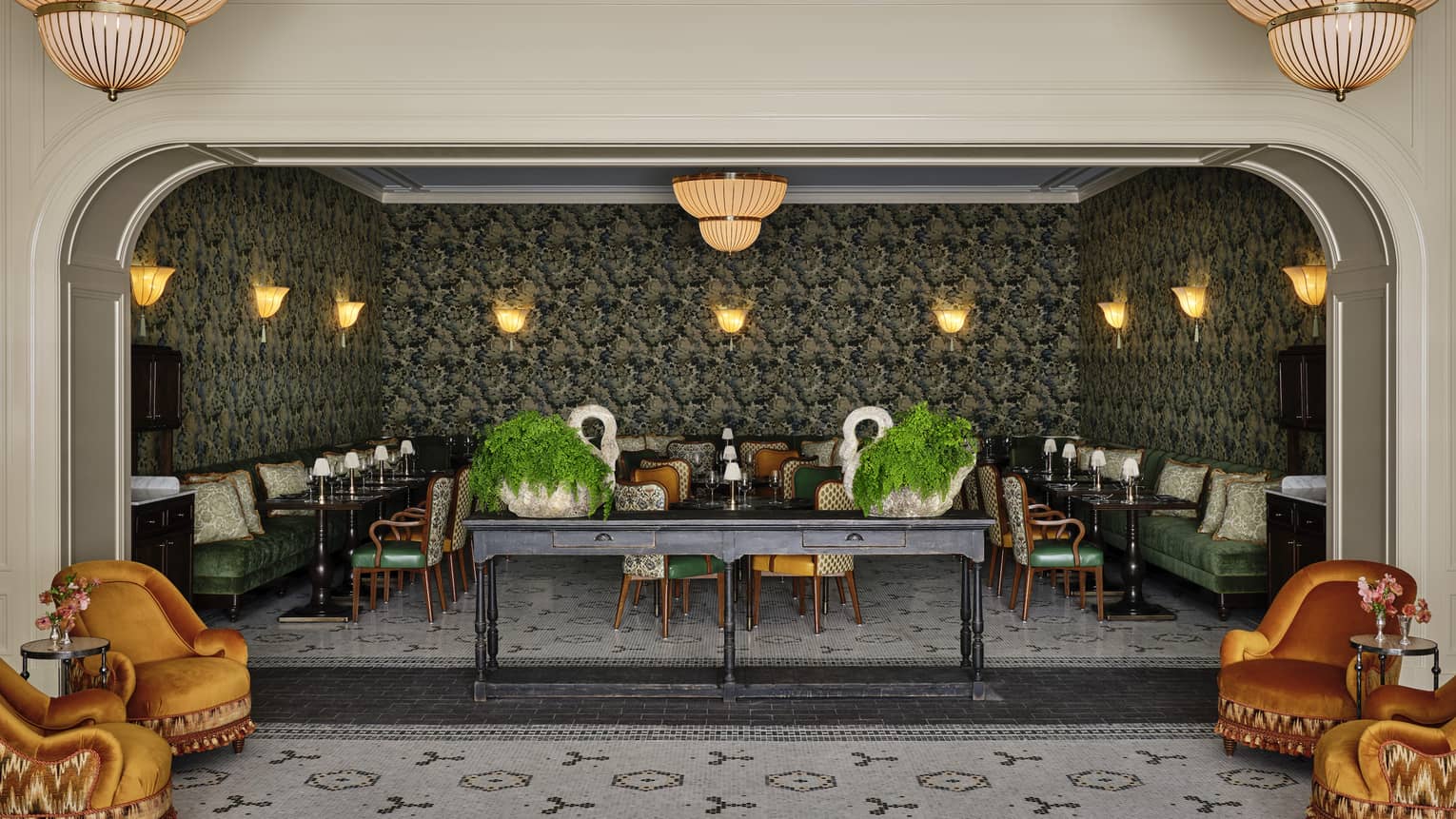 A sitting area with many chairs and small tables.