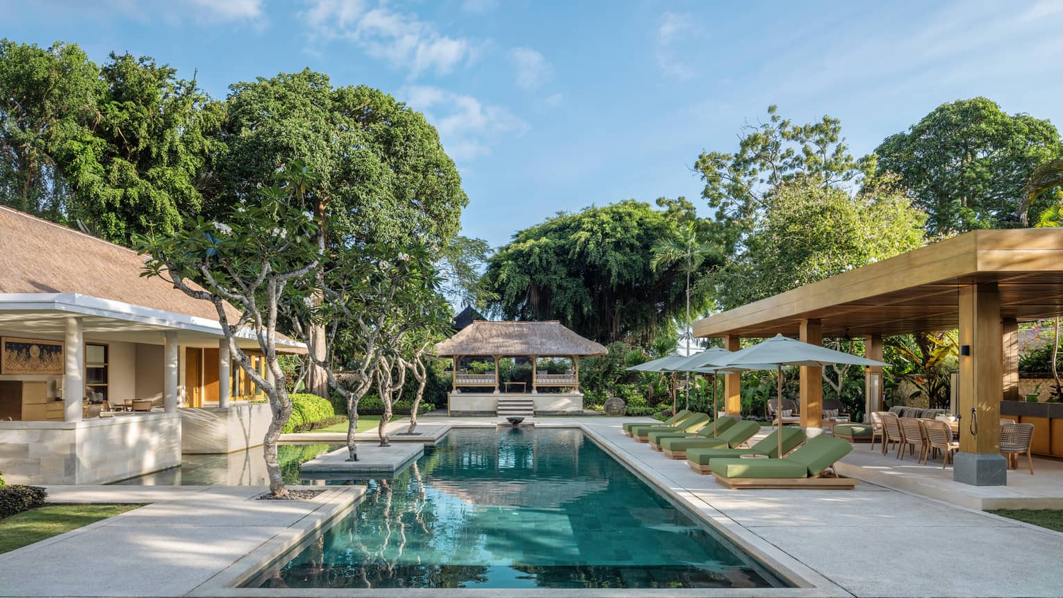 Outdoor swimming pool of luxury residence at Four Seasons Resort Bali at Jimbaran Bay