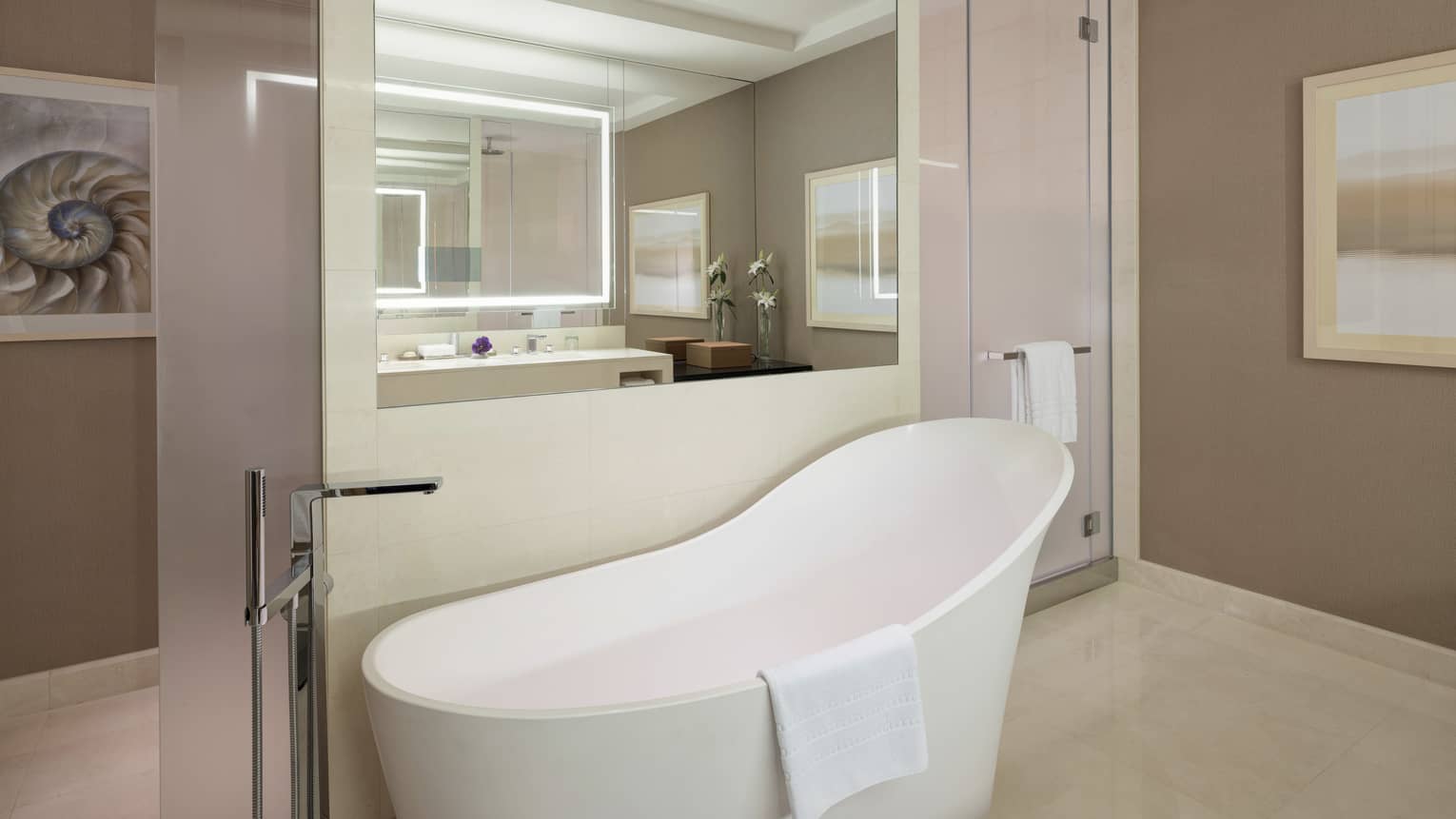 Bathroom with freestanding tub, large mirror