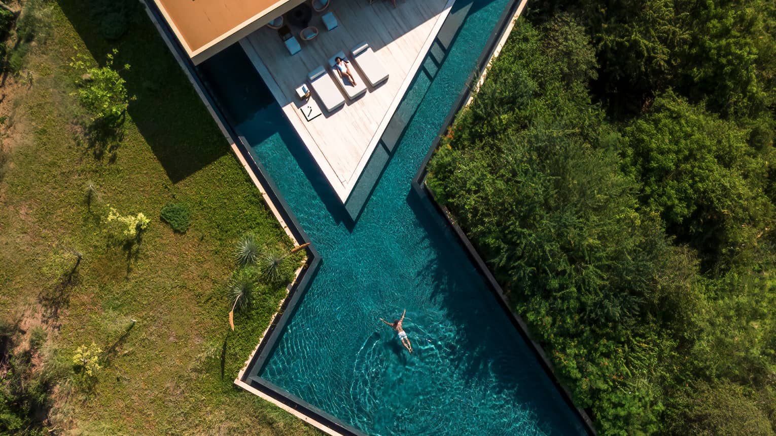 Aerial view of geometric pool of private villa