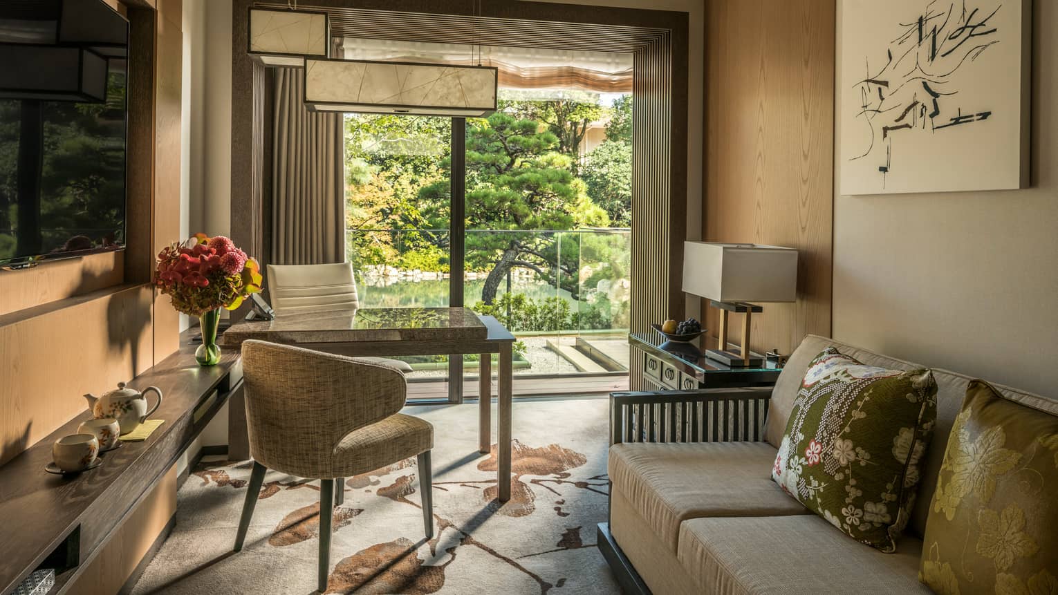 Four Seasons Executive Suite at Four Seasons Hotel Kyoto with view of 800-year-old Pond Garden through patio door