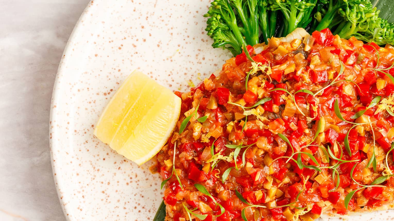 Seabream with caper and olive sofrito and broccolini