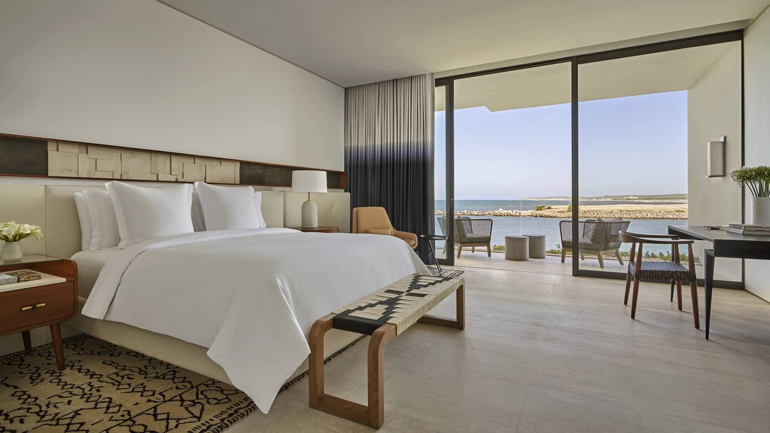 Bedroom with king bed and walk-out, ocean-view terrace