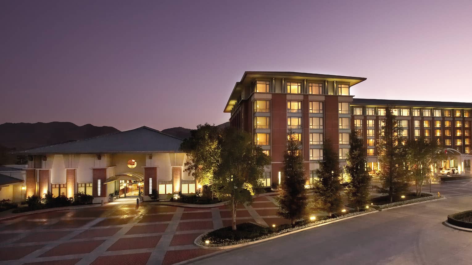Four Seasons Hotel Westlake Village hotel exterior, lights, driveway at dusk