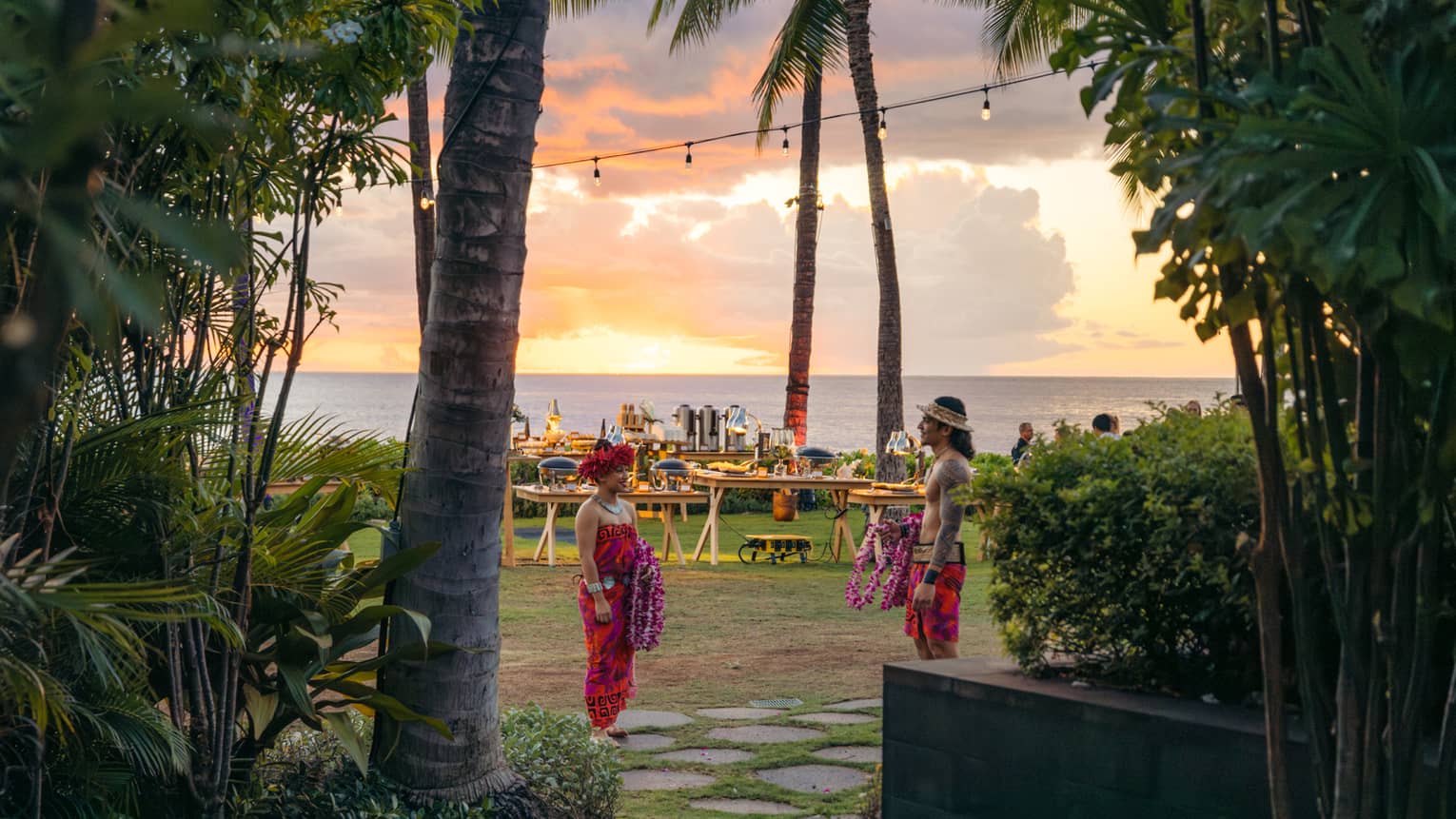 Traditional Hawaiian ceremony at tropical beachside resort