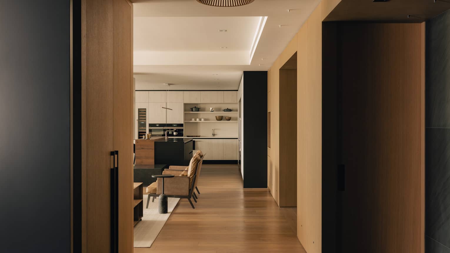 Hallways of modern apartment-like resort residence with hardwood floors