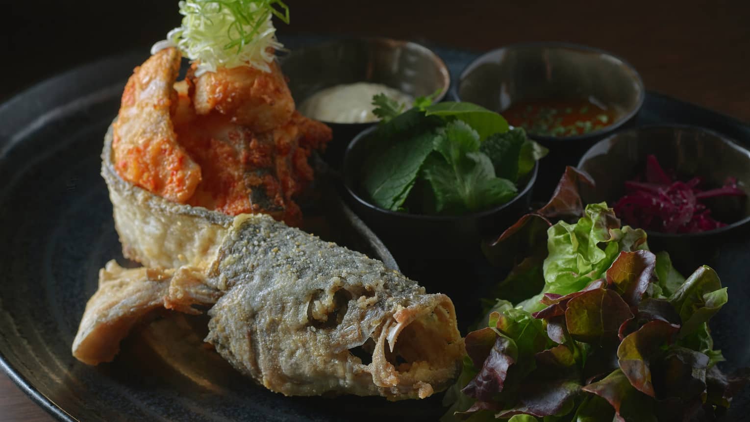 Whole Crunchy Sea Bass with Ssam Wrap, Herbs and Pickled Cabbage