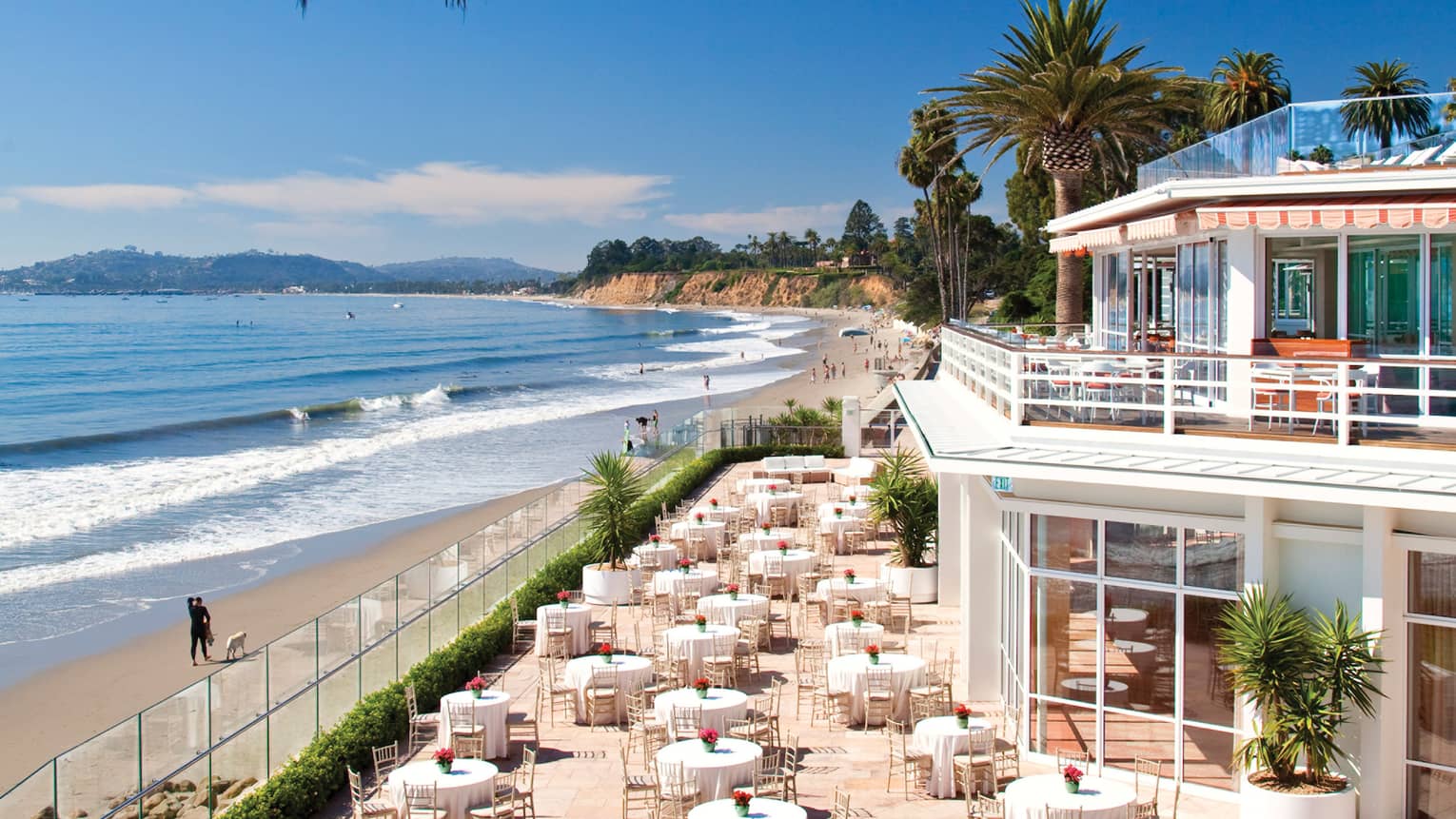 View over sunny La Pacifica Terrace by beach, ocean