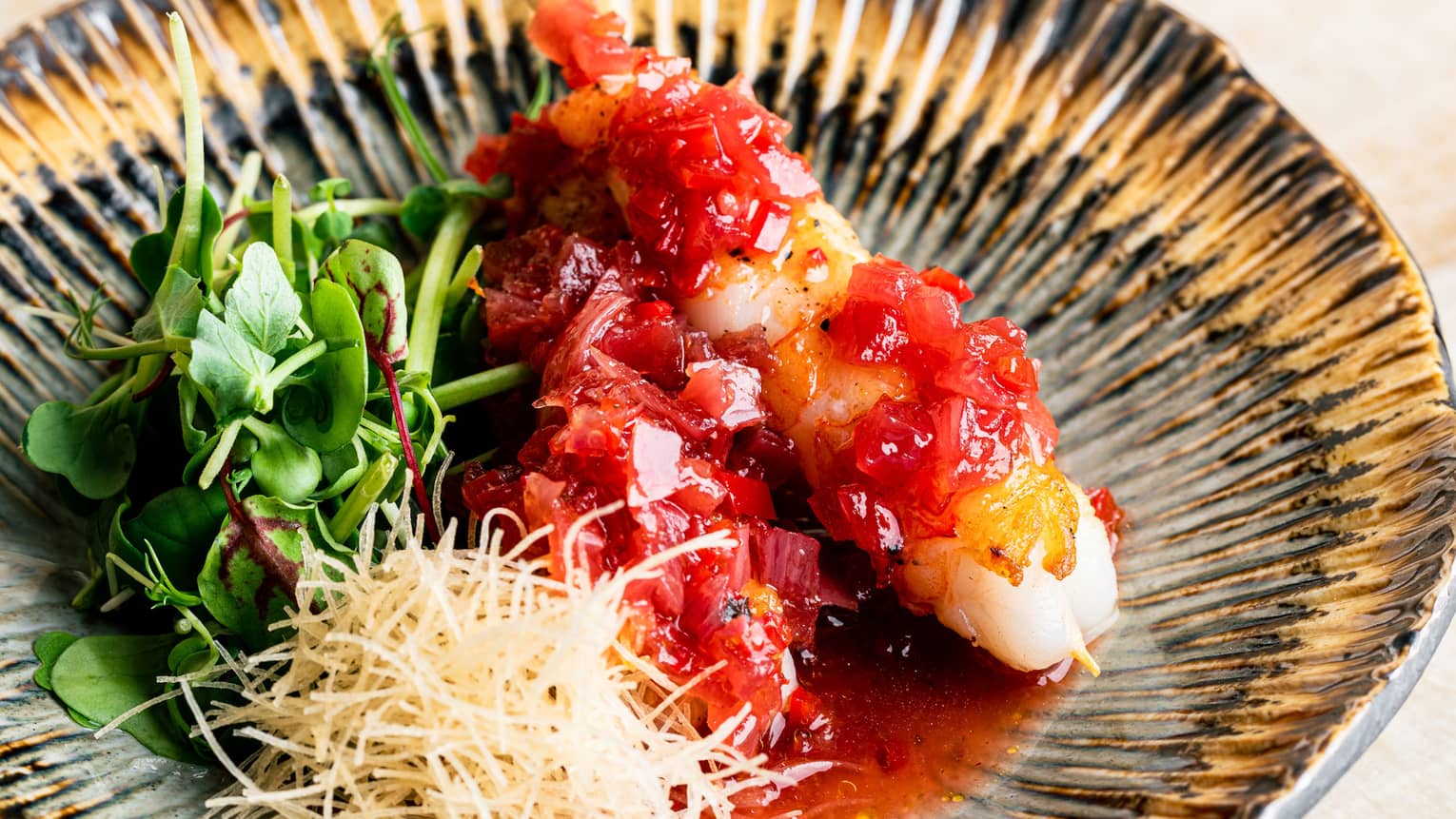 Roasted Scampi on sticks with Red Salsa Sauce and Microgreens