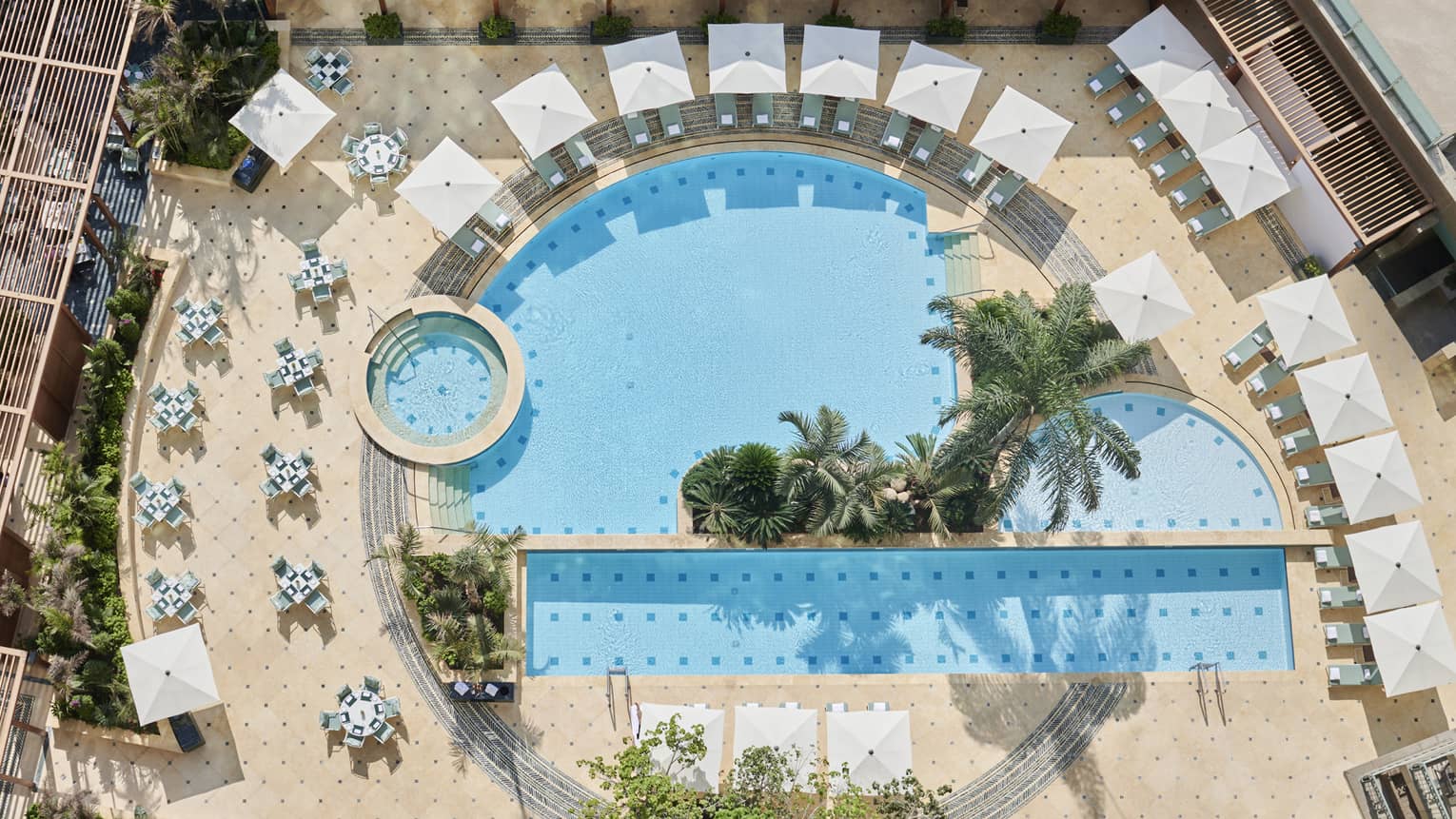 Aerial view of the outdoor pools surrounded by lounge chairs