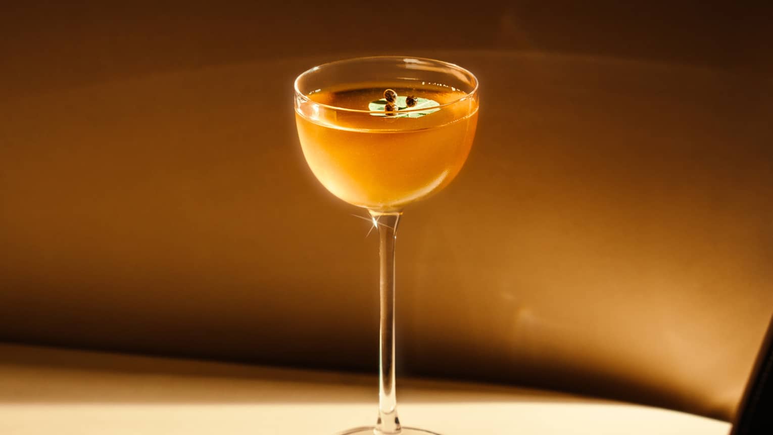 Bourbon cocktail served in a gimlet glass
