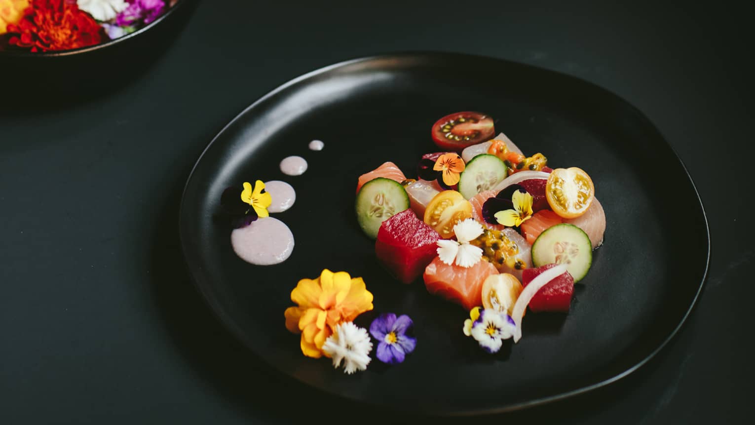 Lomi Lomi Seafood Salad with fresh flowers as a garnish
