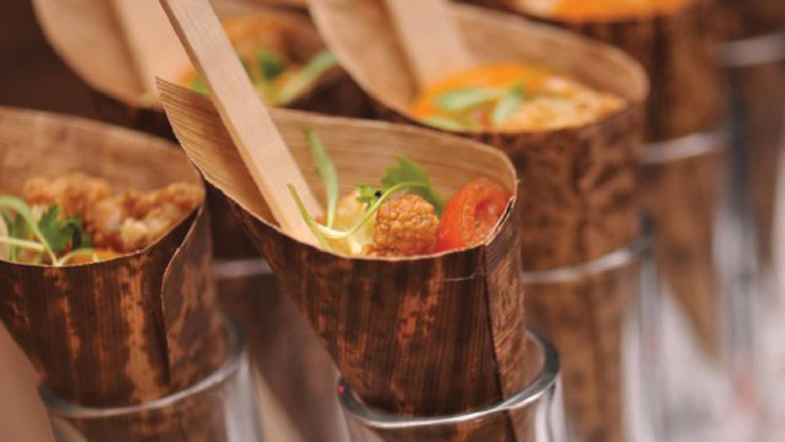 Close-up of rows of h'ors devours in paper cones