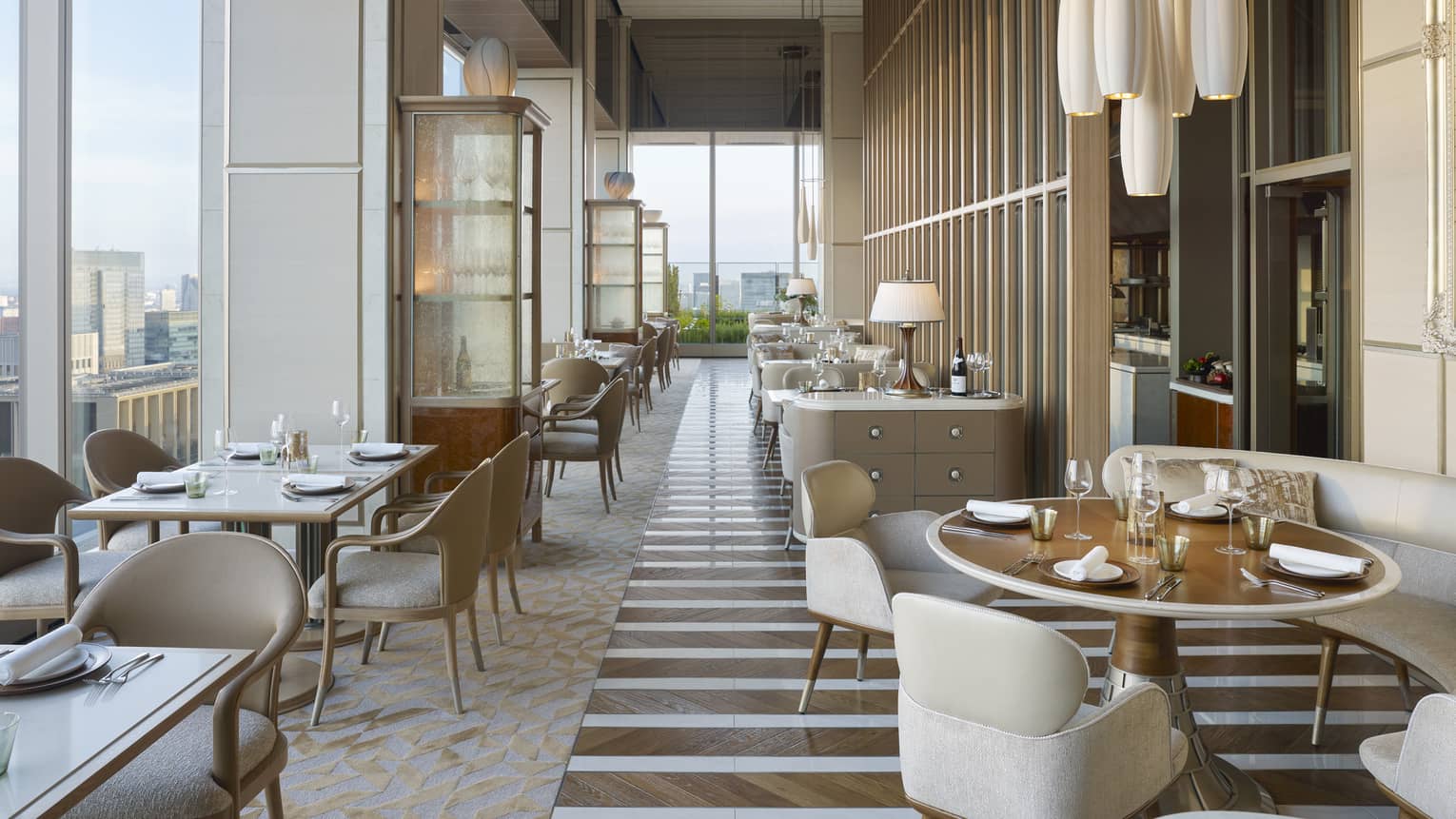 EST restaurant bright, modern dining room with floor to ceiling windows