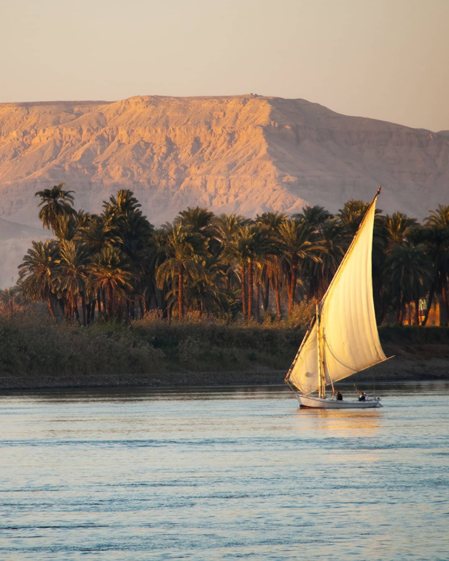 Boat on river during day trip from luxury resort