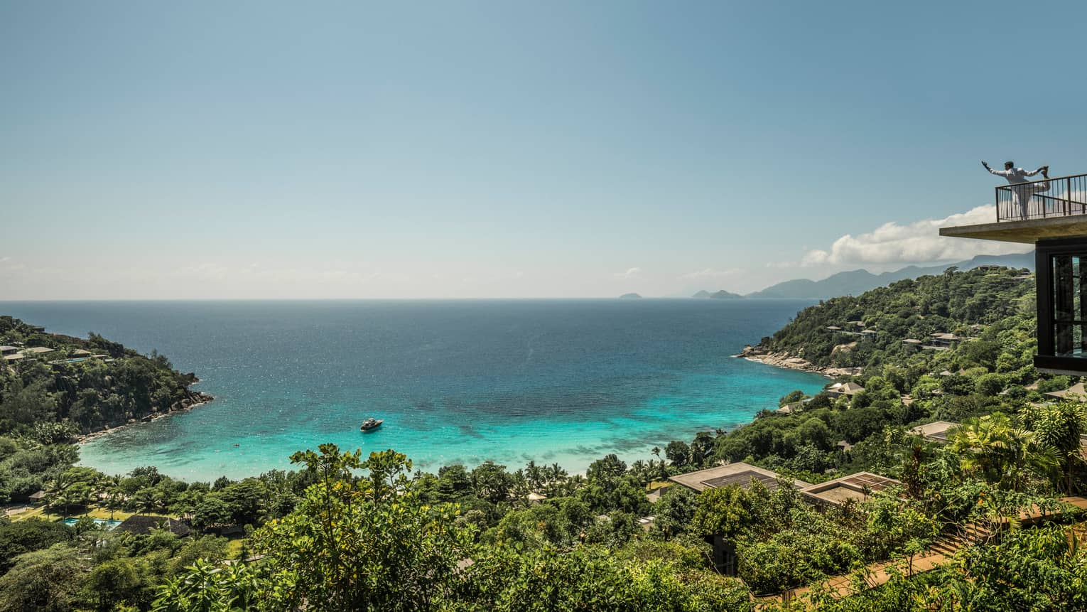 Aerial view of resort tropical forest and turquoise lagoon