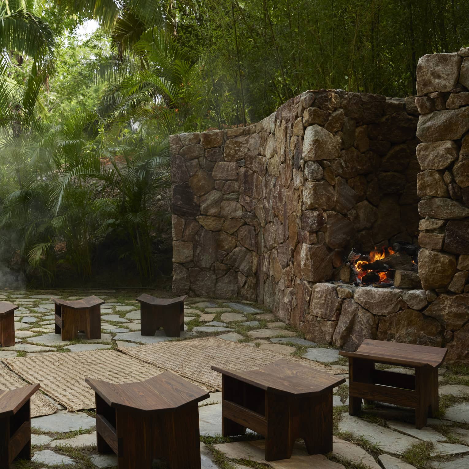 Outside a traditional temazcal or "house of heat," surrounded by lush tropical trees