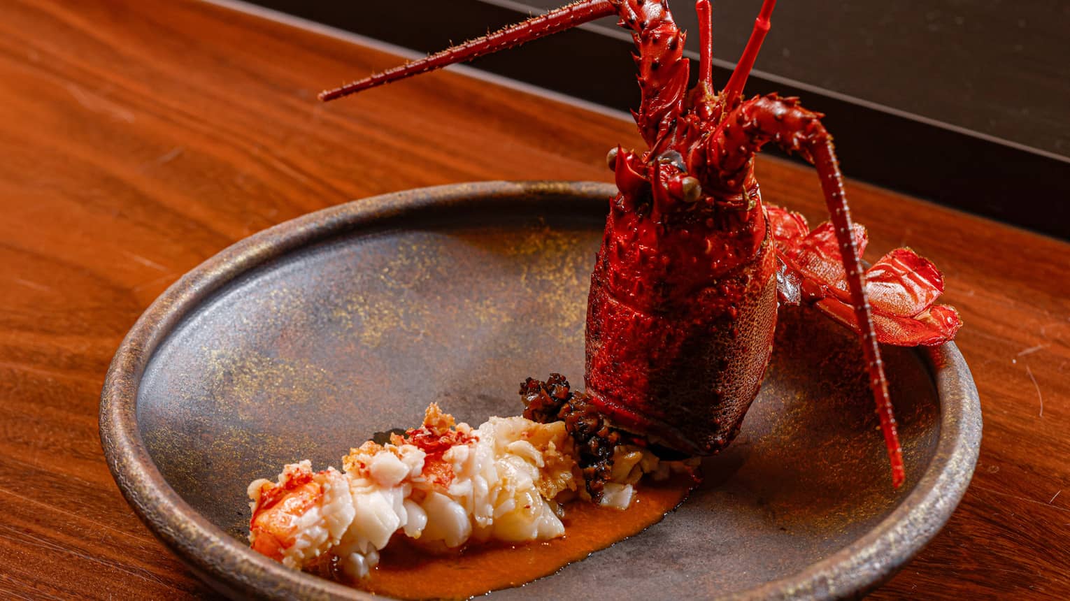 Teppanyaki Grilled Ise Ebi dish, featuring an artfully displayed cooked lobster