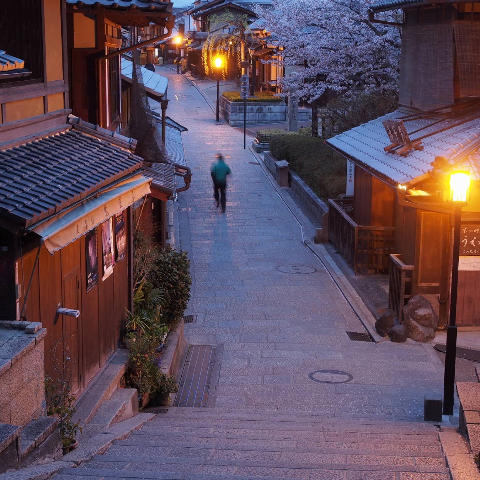 a winter scene on a shopping street in kyoto