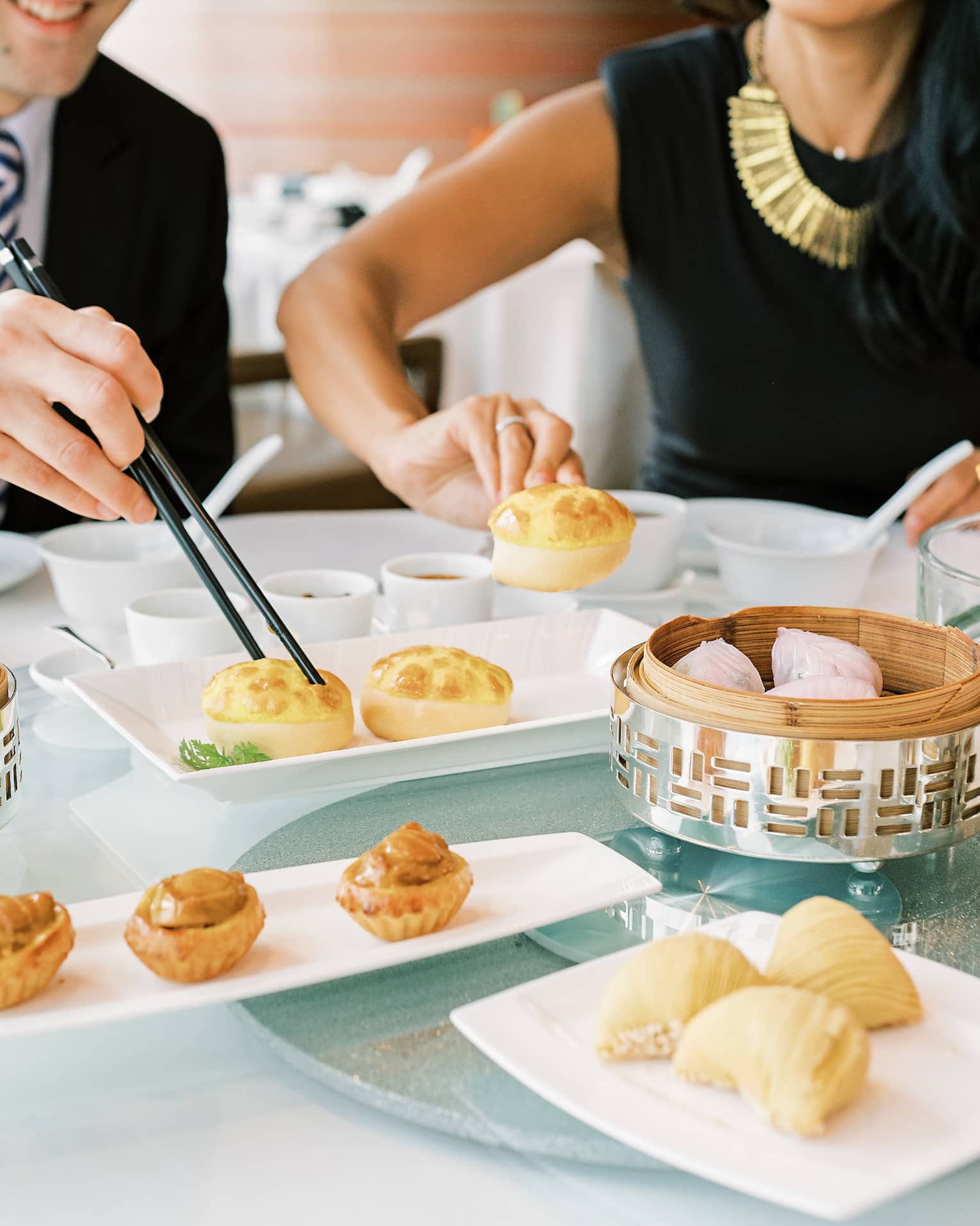 Couple enjoys an extensive dim sum selection