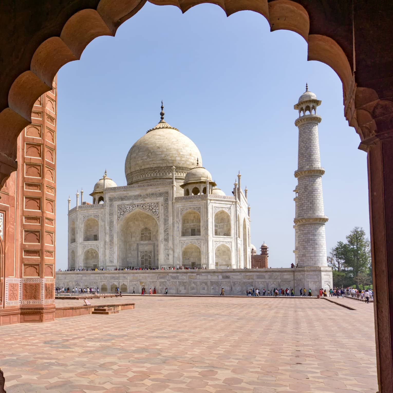 Taj Mahal through the view of a nearby corridor