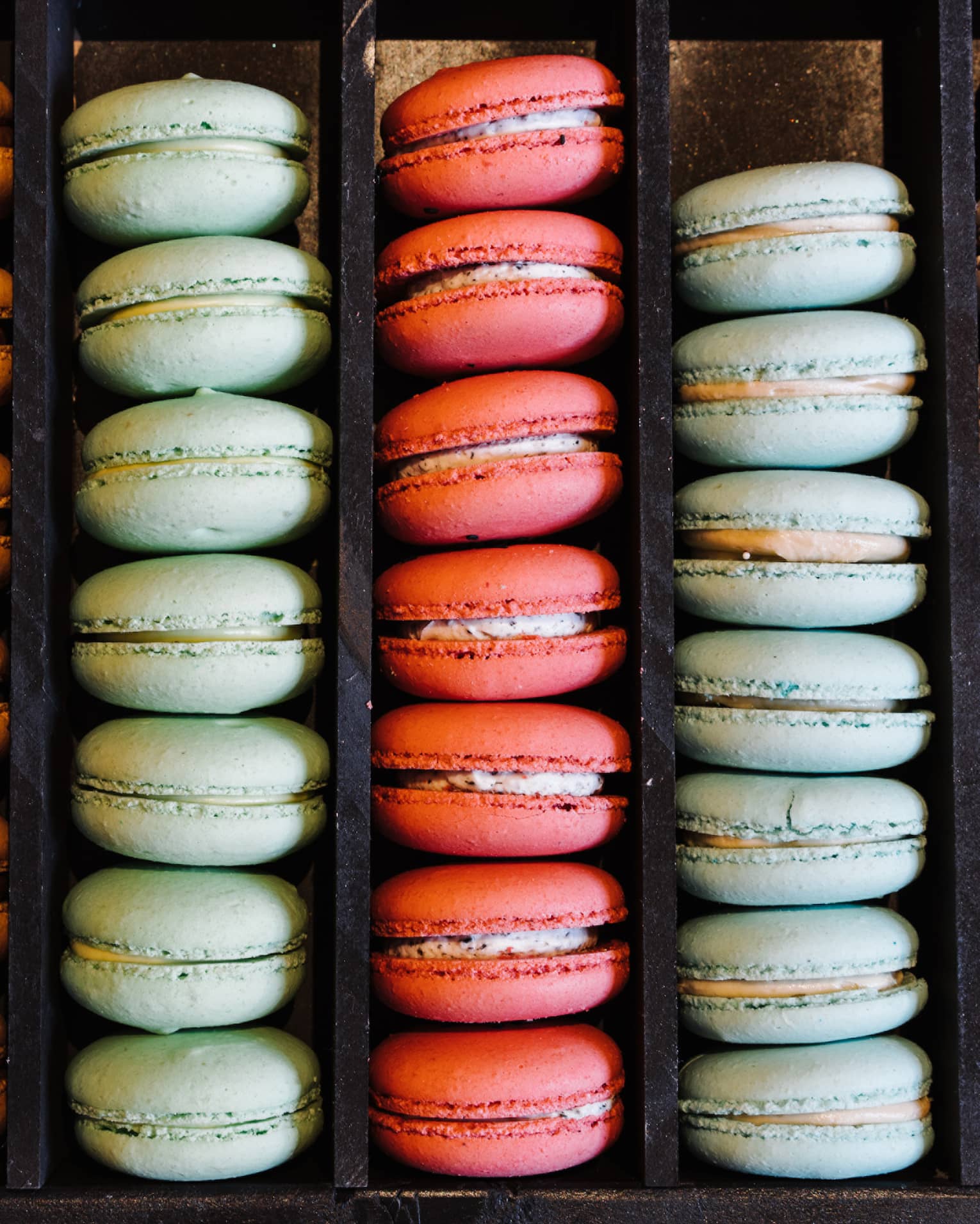 Rows of colourful macaron desserts