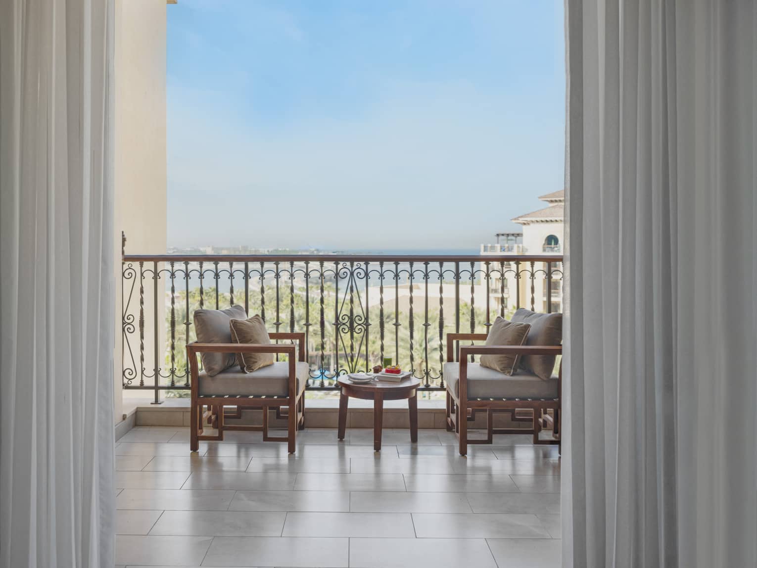 Private terrace of a hotel suite, looking out to the sea