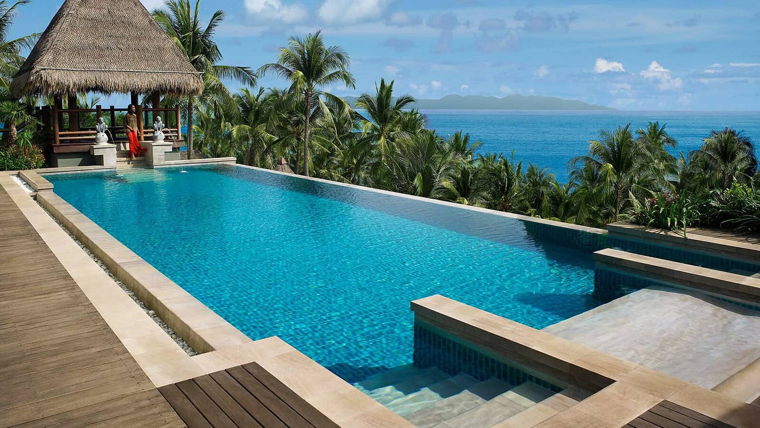 Five-Bedroom Residence Villa with Pool on sunny deck, cabana with thatched roof, ocean view