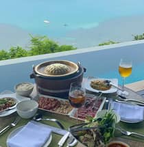 Poolside dining with an ocean view