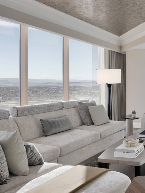 Light-filled living room and dining room of Sunrise Panoramic Suite at Four Seasons Hotel Las Vegas