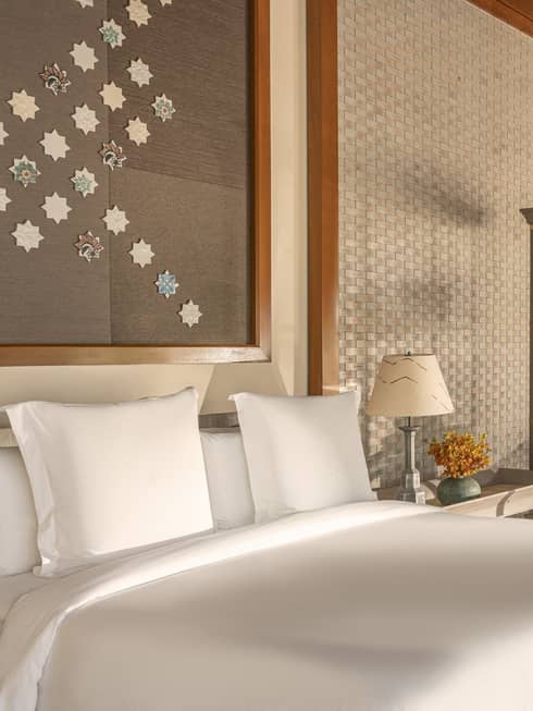 Bedroom with sitting area, opening up to private terrace
