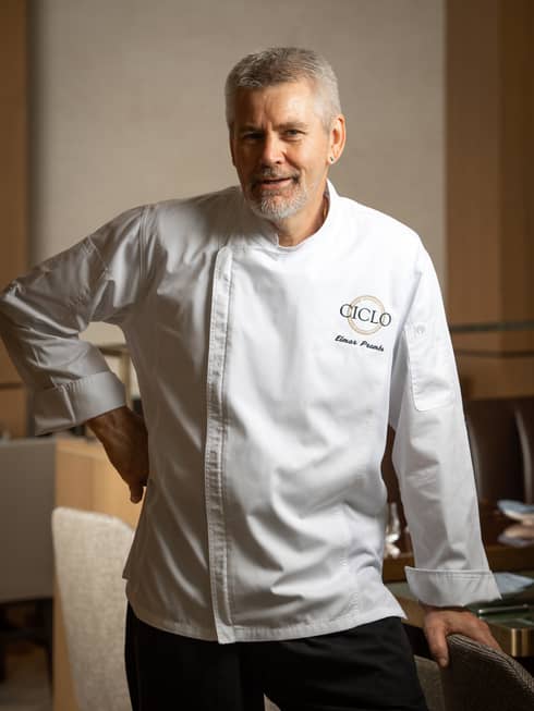 Portrait photo of Chef Elmar Prambs in uniform