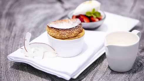 French toast and fresh fruit with coconut garnish