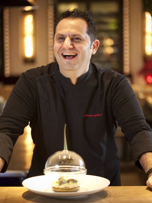 Chef Guillaume Galliot in black chef's jacket