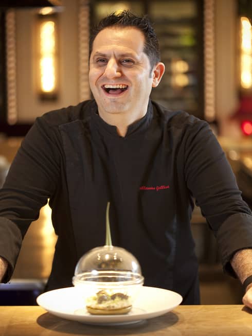Chef Guillaume Galliot in black chef's jacket