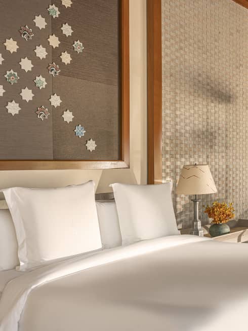 Bedroom with sitting area, opening up to private terrace