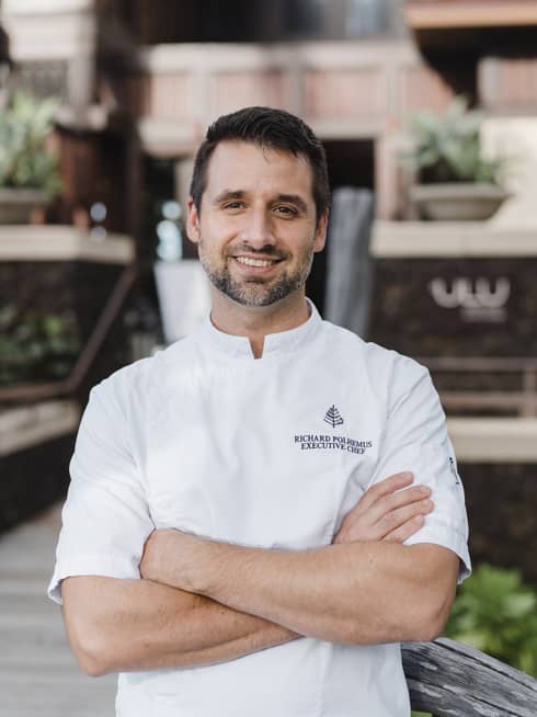 Portrait photo of Chef Richard Polhemus wearing uniform with arms crossed