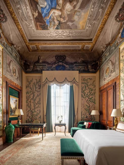Lavish suite with historic frescoed walls and ceiling