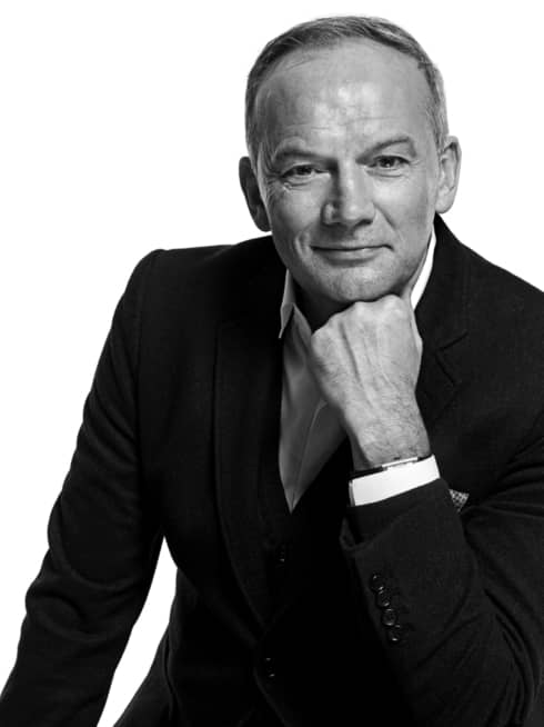 Black-and-white portrait photo of Executive Chef Christian Le Squer