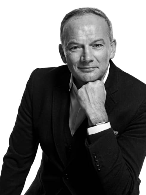 Black-and-white portrait photo of Executive Chef Christian Le Squer